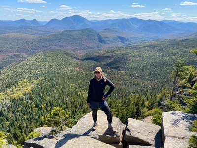 Andrea Zelinski stands on Zealand Mountain in New Hampshire during her seven-month hike on the Appalachian Trail.