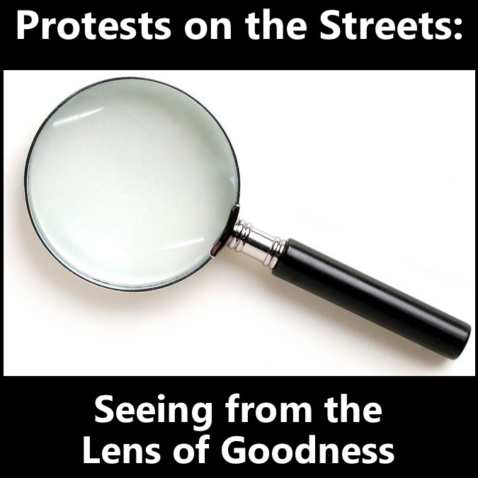 Protests on the Streets:  Seeing from the Lens of Goodness, photo of magnifying glass