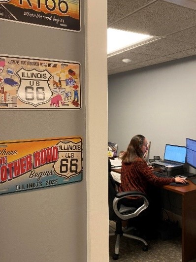 Photo of Maria Sorto in her office at the Illinois Route 66 Scenic Byway