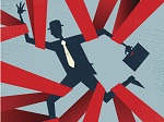 Image of business man entangled in red tape