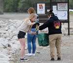 Environmental Studies students collection trash from Lake Springfield.