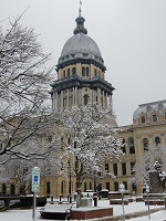 Illinois state Capitol in Springfield in January with snow on the ground
