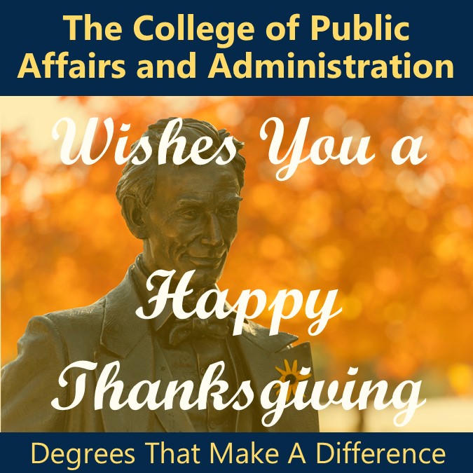 Image of the UIS Lincoln Statue with fall leaves in the background.  Message of The College of Public Affairs and Administration wishes you a Happy Thanksgiving.